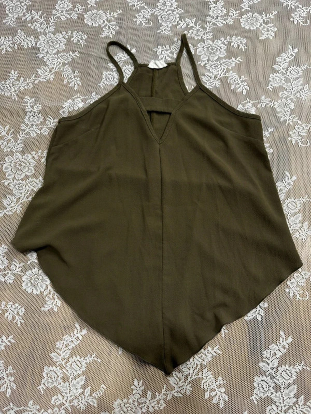 green halter top with triangle cut out